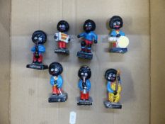 Group of 7 Robertson's Golly figures, height of tallest 7.5cm (7).