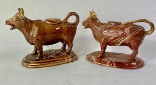 Two Staffordshire Pottery Cow Creamers both with original lids 11.5cm high (2)