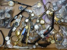 Large collection of ladies' and gentlemen's wrist watches, mostly quartz, together with watch heads,
