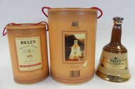 Three Bell's Whisky full and sealed porcelain decanter's, finished in 22 Carat Gold, two are