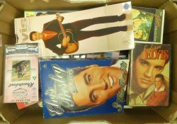Elvis Presley collection to include:- Films on VHS Cassettes , calendars etc(1tray)