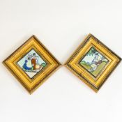 A pair of Tubelined tiles, one decorated with Dutch man & woman and the other with shepherd