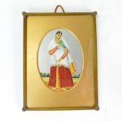 Early 20th century hand painted oval picture of a Indian Woman in brass frame, overall 20cm x 16cm.