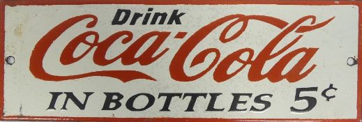 Enamel 'Coca-Cola' advertising sign. (H: 10cm x L: 30.5cm)