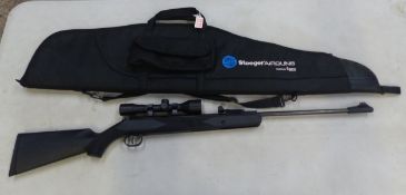 Xisico XS25S .22 break barrel air rifle, with a 4x40 scope fitted, together with a black soft