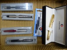 A cased Sheaffer gold-plated fountain pen, together with four Parker fountain pens (5).