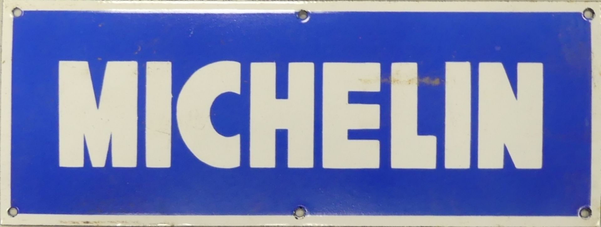 Enamel 'Michelin' advertising sign. (H: 15cm x L: 40cm)