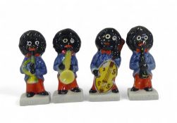 Wade Whimsies, Robertson's Jam Golly band figures, each playing a musical instrument, h.7cm. (4)
