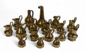 Wade large selection of 'Gold Lustre' ware to include various size and shaped jugs and decanters(
