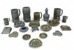 A collection of Irish Wade to include tankards, trinket boxes, pin dishes, ashtrays vases, urns
