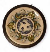 Moorcroft Plate 783/10, 'Juneberry' designer Anji Davenport on a cream ground, measures 30cm