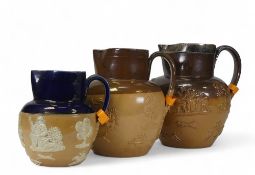 Doulton Lambeth Salt Glazed Stoneware Jugs late 1900cc. Relief design depicting tavern and hunting