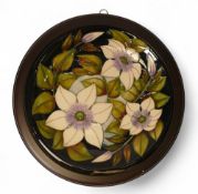 Moorcroft Plate 783/10, 'Sophie Christina' designer Sian Leaper on dark blue ground measures 30cm