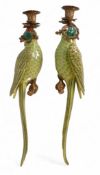 A pair of ornate porcelain parrot wall sconce with metal bronze effect candlestick mounts. 48cm tall