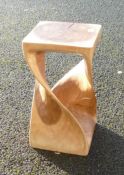 Handmade double twist wood side table.