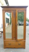 An Art Nouveau Wardrobe with Mirrored Doors. Height: 199cm