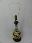 Moorcroft Hibiscus Moon pattern table lamp, overall height to top of electrical fitting 43cm.