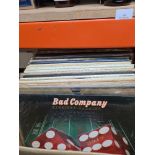 A good lot of vinyl LP records including numerous examples by Yes, Genesis and Rainbow, a few Beatle