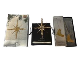 Two Georg Jensen Christmas decorations to include Christmas Collectibles ice skate and Johanne star,