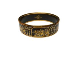 Hermès black enamel bangle with horse decoration