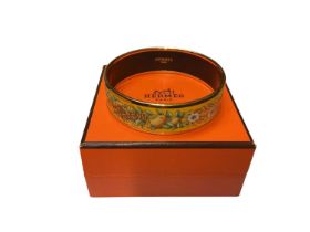 Hermès yellow enamel bangle with flower, wheat and fruit decoration, in box