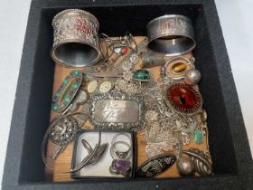 Group of silver and white metal jewellery including various chains, pendants, gem set rings, silver