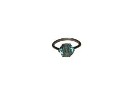 Blue zircon single stone ring in six claw setting on white metal shank