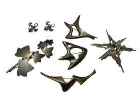 Three George Tarratt silver brooches to include a leaf brooch by Geoffrey Guy Bellamy and two abstra