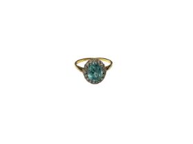 Blue zircon and diamond cluster ring