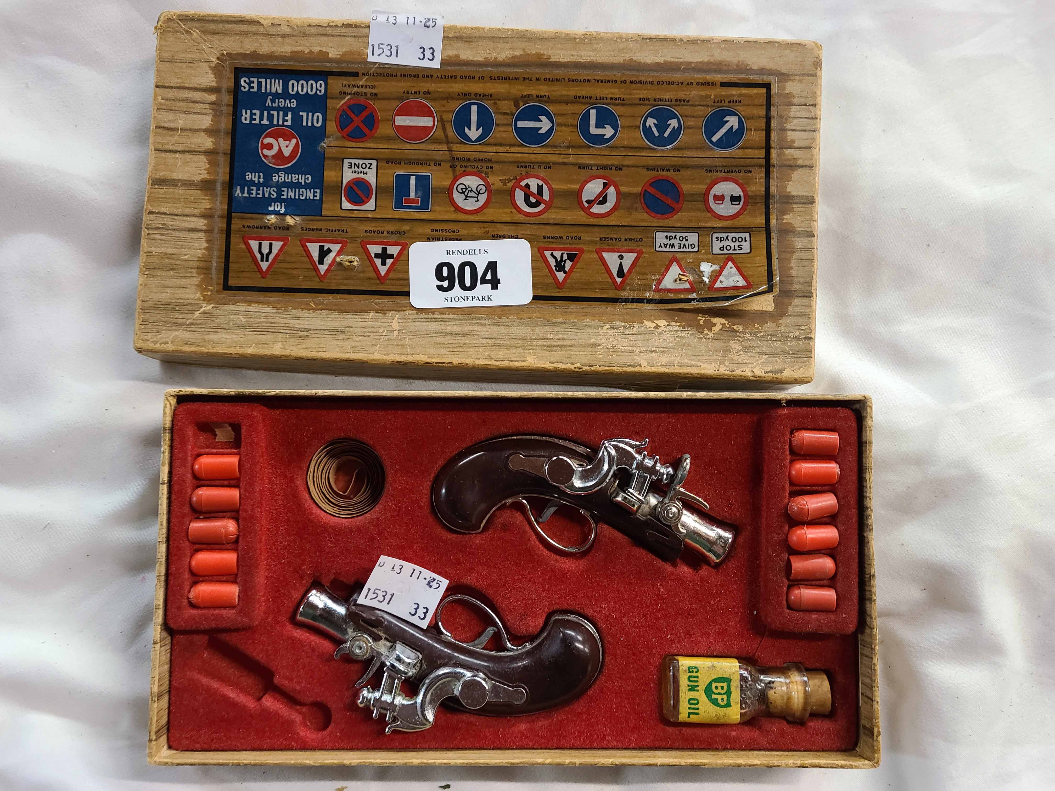 A vintage cap gun set in original box