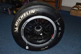 A FORMULA RENAULT RACE SERIES WHEEL, with Michelin 23/57-13 tyre, the rim printed 'Formula