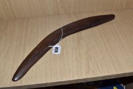 AN EARLY 20TH CENTURY ABORIGINAL BOOMERANG, hand-carved wooden boomerang, human and animal