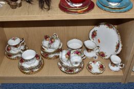 A GROUP OF ROYAL ALBERT 'OLD COUNTRY ROSES' TEAWARES comprising a double-handled cake plate (dull