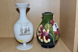 A MOORCROFT POTTERY 'HIBISCUS' PATTERN LAMP BASE, together with a transfer printed milk glass