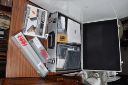 A CASE AND LOOSE UNIMAT MODULAR SAW SYSTEM, to include a Unimat 1 circular saw, saw table, The