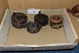 A BOX OF FOUR VINTAGE FISHING REELS, comprising a Bakelite Modernite Pixie reel, a painted metal
