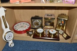 A GROUP OF CLOCKS, comprising Staiger, Hermle and Metamec mantel clocks, a Jones wall clock, a