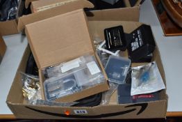 A BOX OF LOCK INTEREST ITEMS to include a boxed three-pack of practice locks, a twenty-piece lock