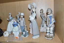 EIGHT SPANISH CERAMIC FIGURINES to include a group of Nao figurines comprising a figure carrying a