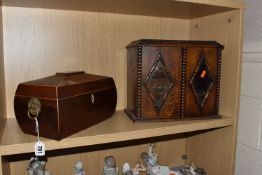AN OAK SMOKERS CABINET AND A SARCOPHAGUS SHAPED TEA CADDY, the oak tea caddy has diamond shaped