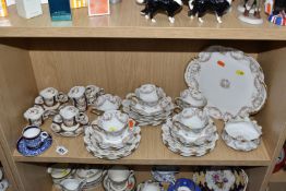 A QUANTITY OF TEA WARES, to include a twenty six piece Theodore Haviland, Limoges for Harrod's Ltd