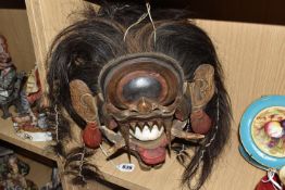 A BALINESE 'KARANG BINTULU/LEYAK MATA BESIK ' 'CALONARANG' RITUAL PERFORMATIVE MASK with a slight