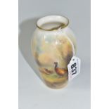 A JAMES STINTON FOR ROYAL WORCESTER 'PHEASANT' VASE with a gilt rim, hand painted scene depicting