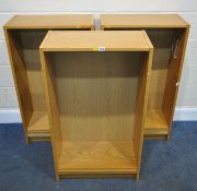 THREE IKEA BOOKCASES, with a total of ten shelves, 60cm x depth 28cm x height 107cm, condition