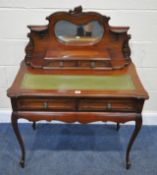 A 20TH CENTURY HARDWOOD LADIES WRITING DESK , the raised back with a kidney shaped bevelled edge