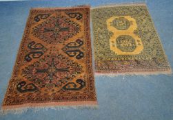 AN AFGHAN GOLD GROUND RUG, with two central medallions, surrounded by a multi-strap border, 121cm