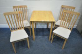 A LATE 20TH CENTURY BEECH DROP LEAF KITCHEN TABLE, raised on cylindrical tapered legs, open width