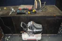 AN AXMINSTER TOOLS AIR COMPRESSOR, two Silverline nailers, a container containing brad nails and