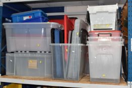 A LARGE QUANTITY OF PLASTIC STORAGE BOXES, an assortment of used storage boxes and lids, some