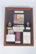 A NICELY FRAMED MEDAL ARCHIVE TO FAMILY MEMBERS, SPANNING WW2 & THE KOREAN WAR, the glazed frame